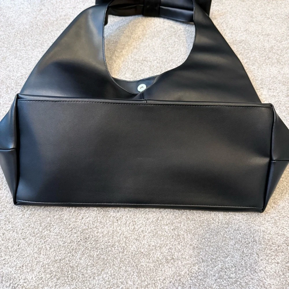 NWT Victoria’s Secret black faux leather hobo bag with bow detail